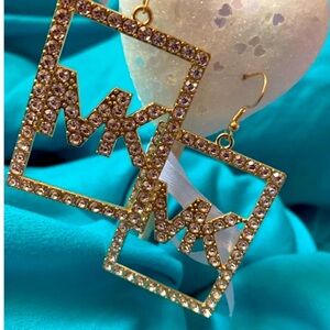 MK dangle earrings